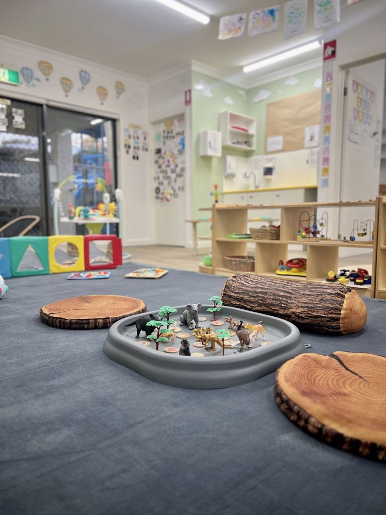 Babies exploring in Joey's Room (0-1 years) at Macarthur Early Learning