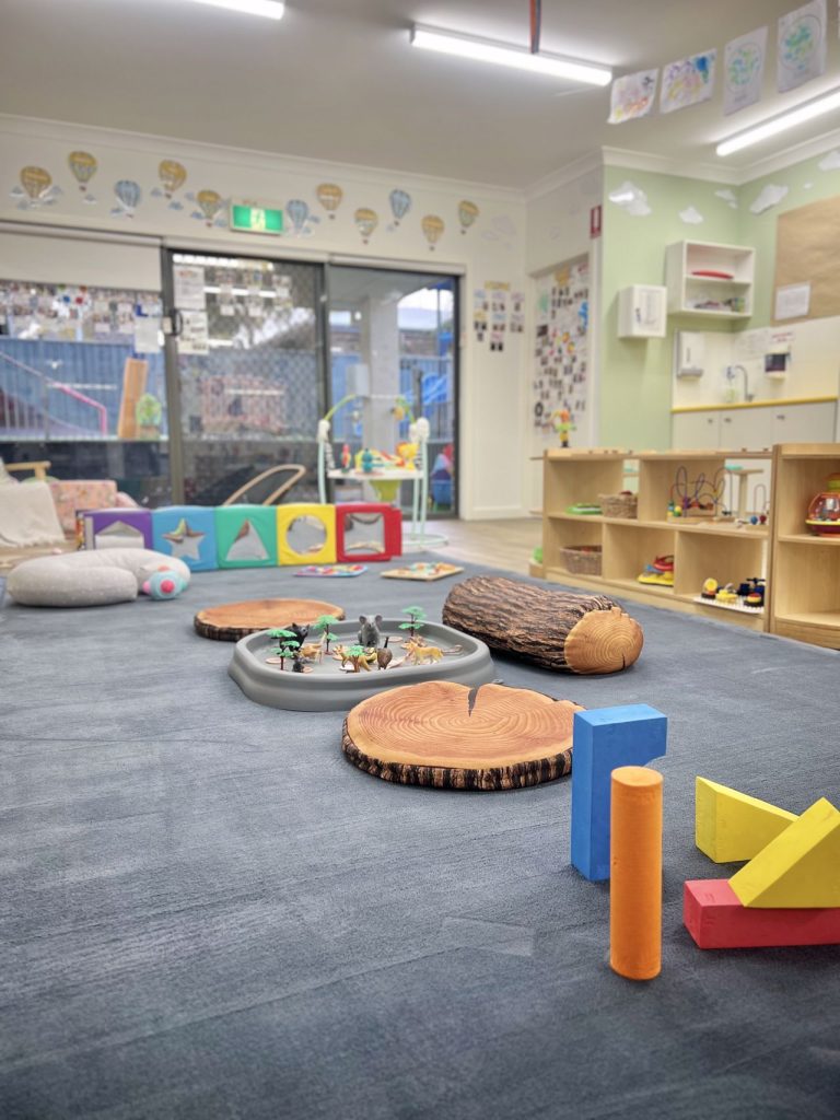 Babies exploring in Joey's Room (0-1 years) at Macarthur Early Learning
