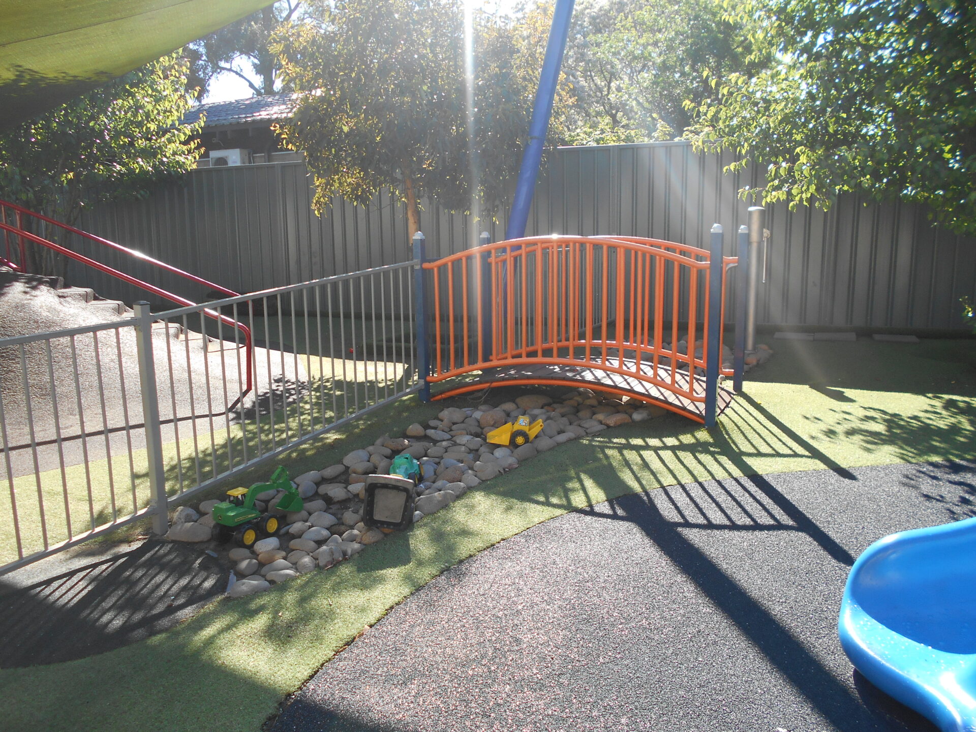 Children playing in the outdoor playground at Macarthur Early Learning